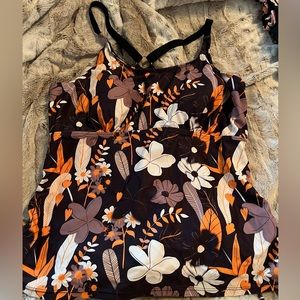 NWT  2 swim tops and 1 swim shorts never worn. Smoke free and pet free home